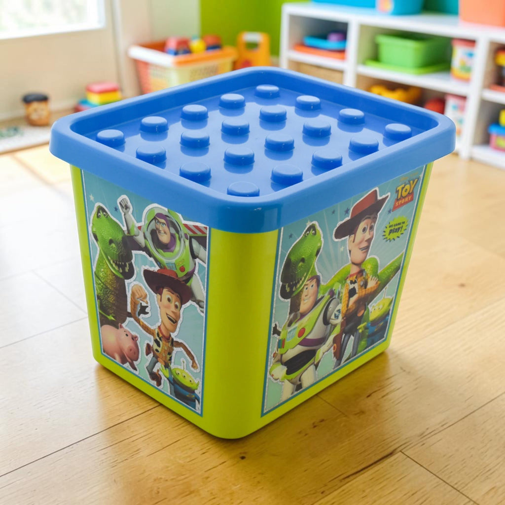 Juguetero organizador Magia Nostálgica de plástico verde con tapa azul y diseño de personajes de Toy Story