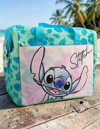 Lonchera térmica Magia Nostálgica de Stitch en poliéster color turquesa con estampado tropical y asas resistentes
