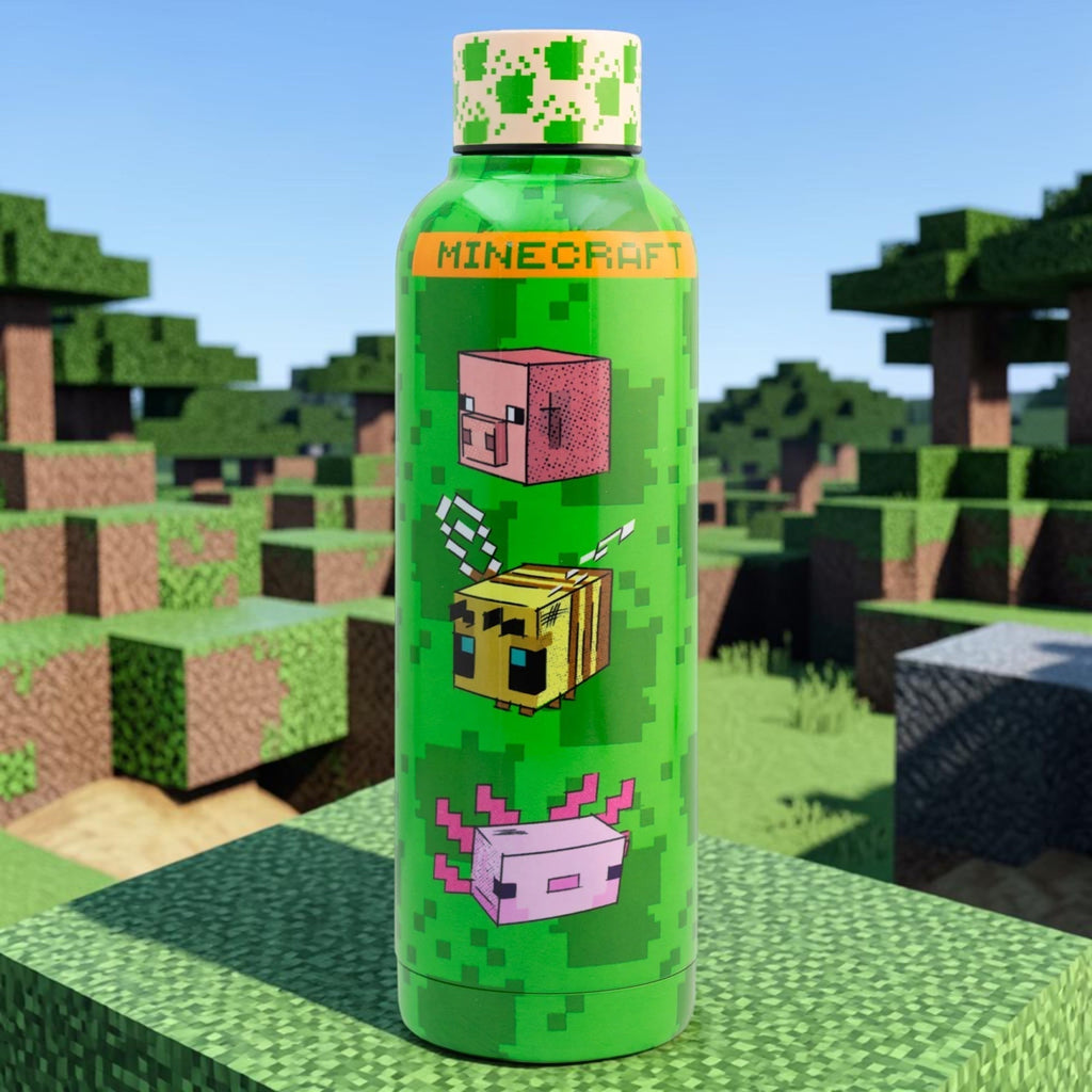 Termo de acero inoxidable Magia Nostálgica de 500ml con diseño de Minecraft, personajes y tapa de rosca hermética.